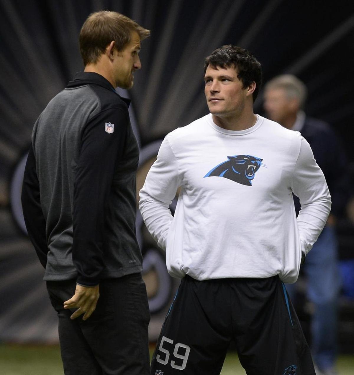 Former Carolina Panthers offensive tackle Jordan Gross (left) talks with Luke Kuechly on the sideline in 2016. The two were teammates for Kuechly’s first two years in the league.