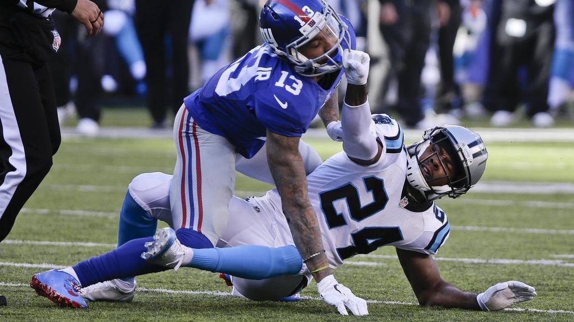 New York Giants wide receiver Odell Beckham (13) and Carolina Panthers' Josh Norman (24) tangle during a Dec. 20 game.