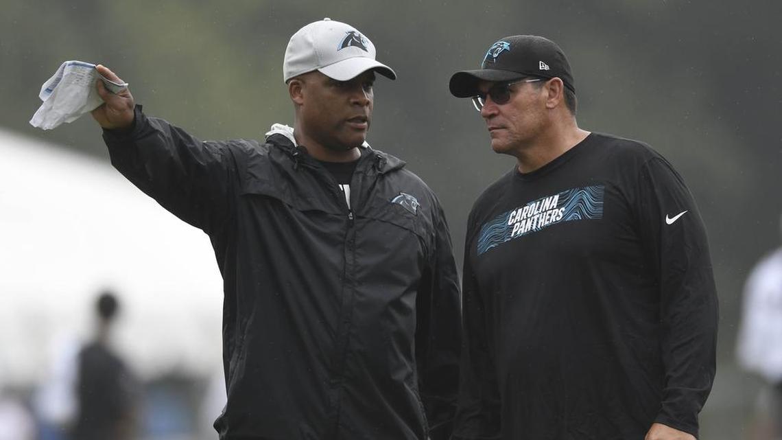 Carolina Panthers defensive coordinator Eric Washington, left, and head coach Ron Rivera (right) will be working together again in 2019.