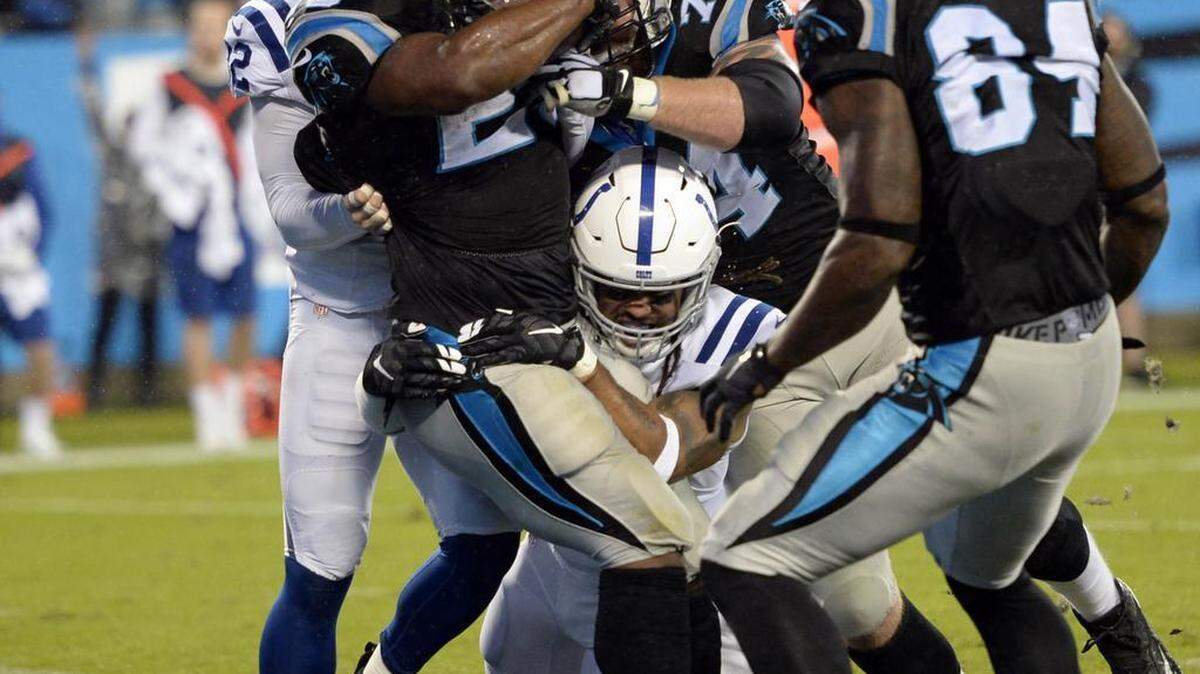 Carolina Panthers' Jonathan Stewart (28) scores a touchdown past Indianapolis Colts' Dwight Lowery (33) in the first quarter at Bank of America Stadium on Monday, November 2, 2015. Panthers led 10-0 in the first quarter.