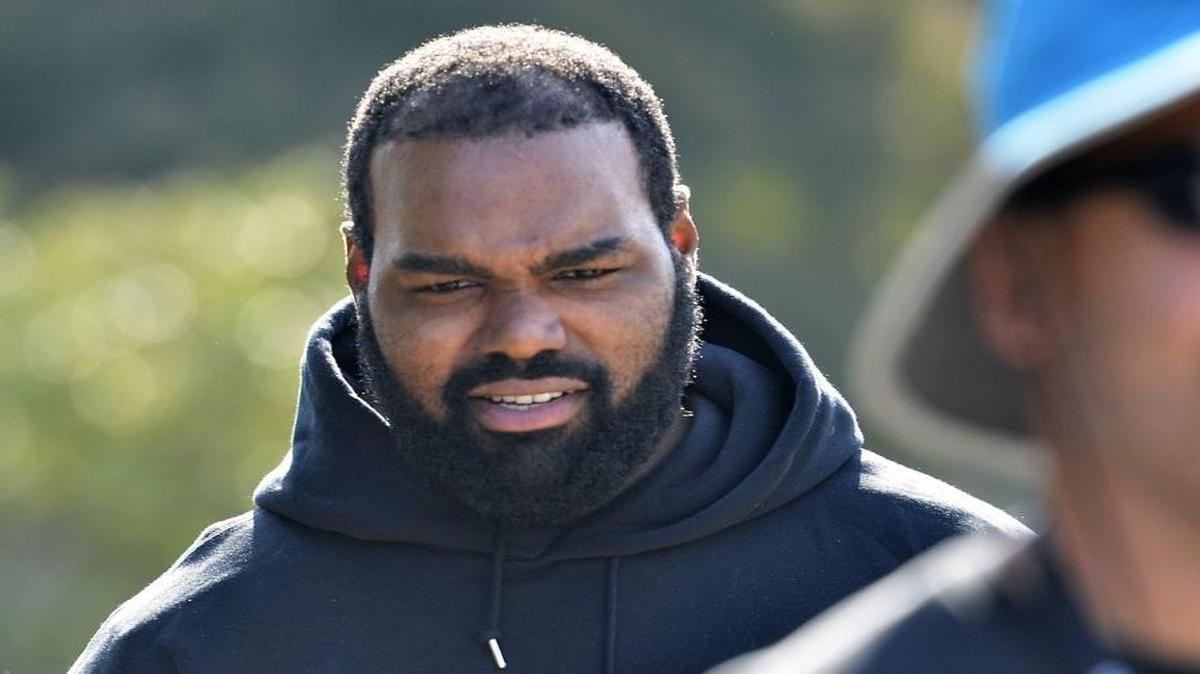 Michael Oher has made two appearances at regular Carolina Panthers practices recently, each time walking laps with a trainer as he goes through the NFL’s concussion protocol.