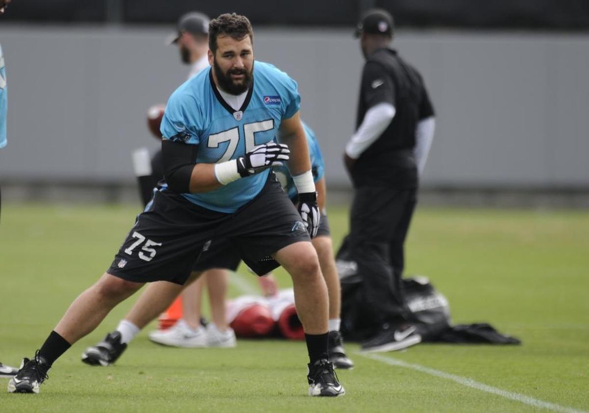 Carolina Panthers tackle Matt Kalil (75) stretches on the last day of mini-camp on Thursday. The Carolina Panthers held their last day of mini-camp on Thursday. Kalil will be tested at full-contact during training camp.