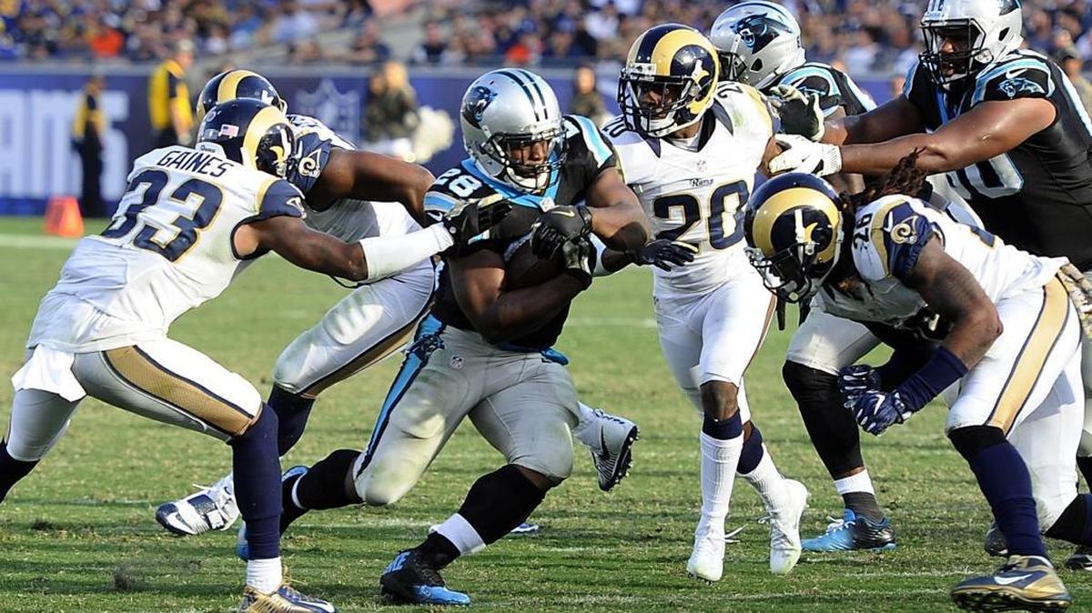 Carolina Panthers running back Jonathan Stewart (28) found yards hard to come by, but the coaching staff stuck with the running game in a 13-10 victory over the Rams.
