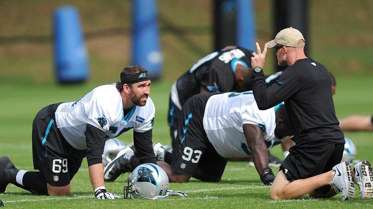 Carolina Panthers defensive coordinator Sean McDermott, right, talks with defensive end Jared Allen, left, during practice on Thursday, October 29, 2015.
