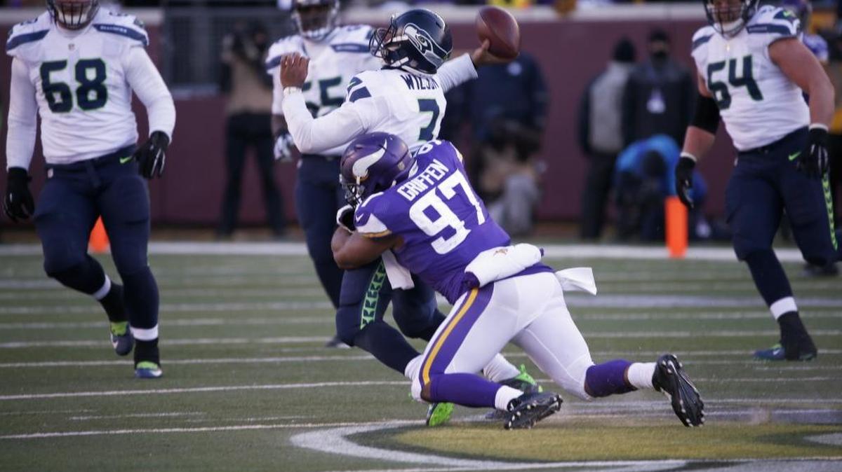 The Carolina Panthers sought clarification of the NFL’s intentional grounding rule ahead of Sunday’s visit by Seattle Seahawks quarterback Russell Wilson (3), who has a knack for getting rid of the ball at the last second.