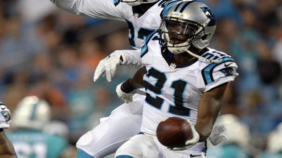 
Carolina Panthers cornerback Teddy Williams (21) celebrates his interception with Melvin White (23) against the Miami Dolphins during a preseason game in August. 
