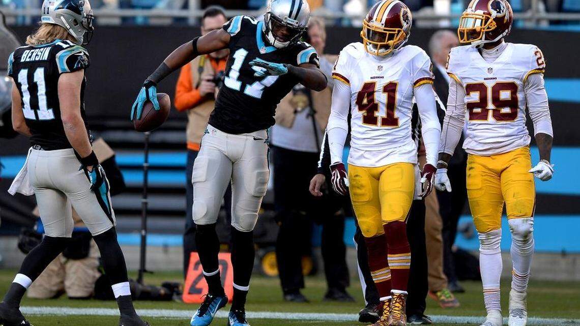 Carolina Panthers wide receiver Devin Funchess celebrates his reception from quarterback Cam Newton during the fourth quarter against Washington as cornerbacks Will Blackmon (41) and Chirs Culliver (28) watch.