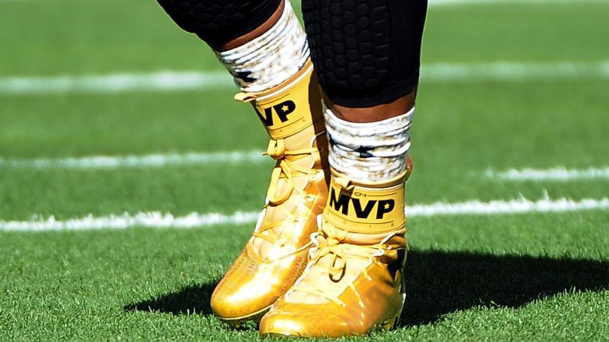 Cam Newton wears gold MVP shoes at Levi's Stadium in Santa Clara, CA for Super Bowl 50 Sunday, February 7, 2016.
