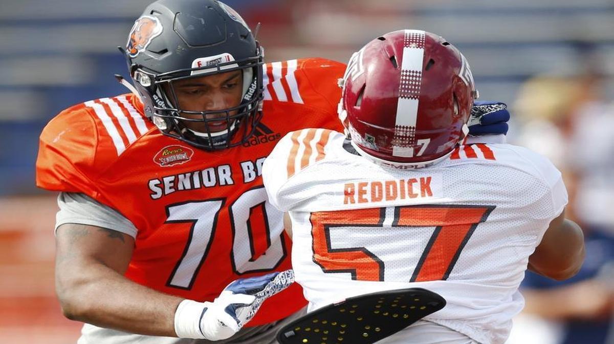 The Carolina Panthers are keeping an eye on offensive linemen at the Senior Bowl. Here, North squad offensive tackle Julien Davenport of Bucknell (70) works against inside linebacker Haason Reddick of Temple (57).