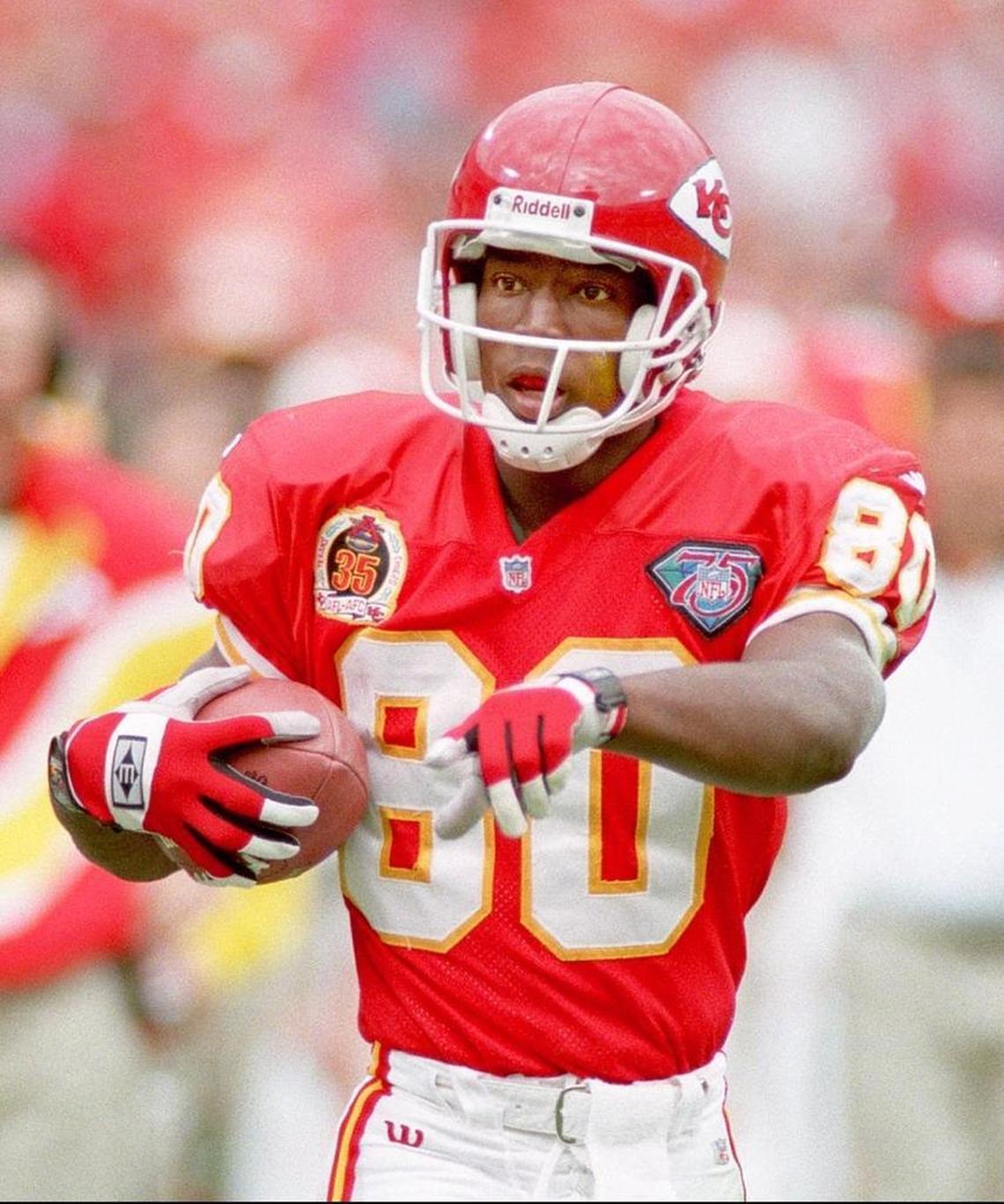 Lake Dawson, 45, has 22 years of experience as an NFL receiver (six years) and in college and pro scouting (16 years). Above, Dawson points to quarterback Joe Montana after Dawson made a catch against the Seattle Seahawks in a 1994 NFL game.