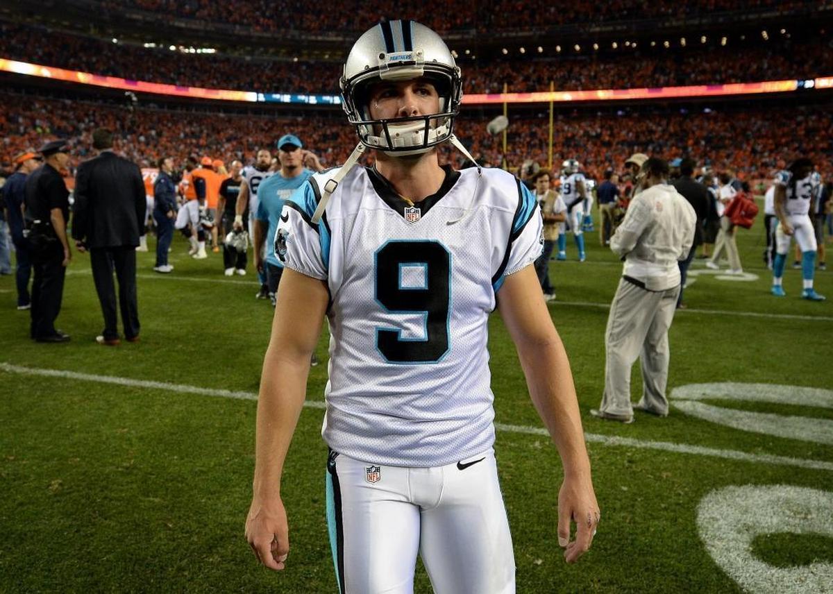 Carolina Panthers kicker Graham Gano walks off the field after missing a possible game-winning field goal in the closing seconds against the Denver Broncos in the season opener.