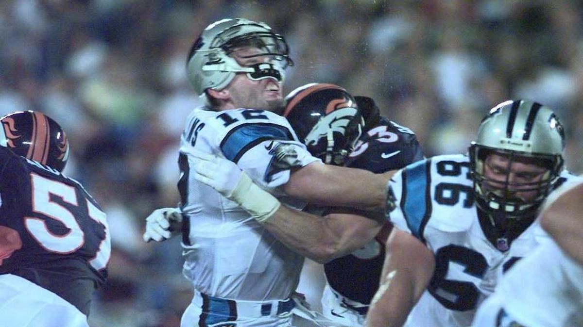 Denver's Bill Romanowski delivers a stunning hit on Panthers quarterback Kerry Collins in a 1997 game. Collins suffered a broken jaw.