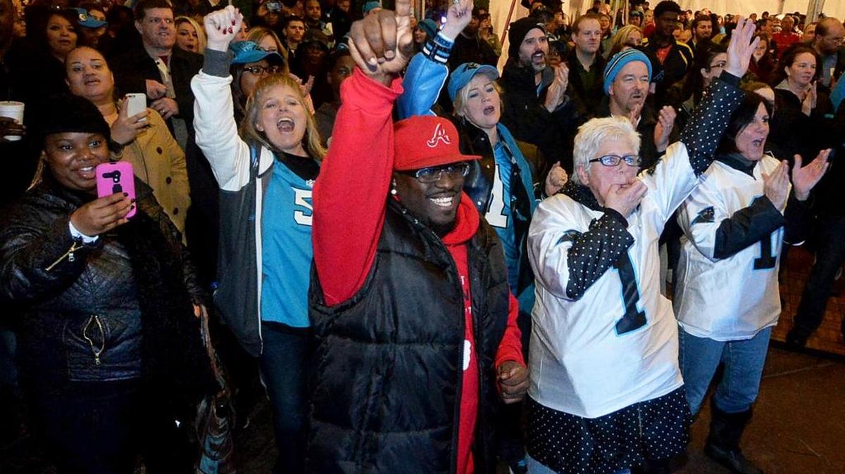The crowd at cheers the PurrCussion band in action at a Carolina Panthers pep rally held at the Epicentre, featuring performances by TopCats and the PurrCussion Band.
