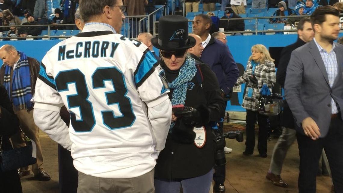N.C. Gov. Pat McCrory dons a customized #33 Carolina Panthers jersey, one that he got when he was mayor of Charlotte in 2004, the last time the Panthers went to the Super Bowl.
