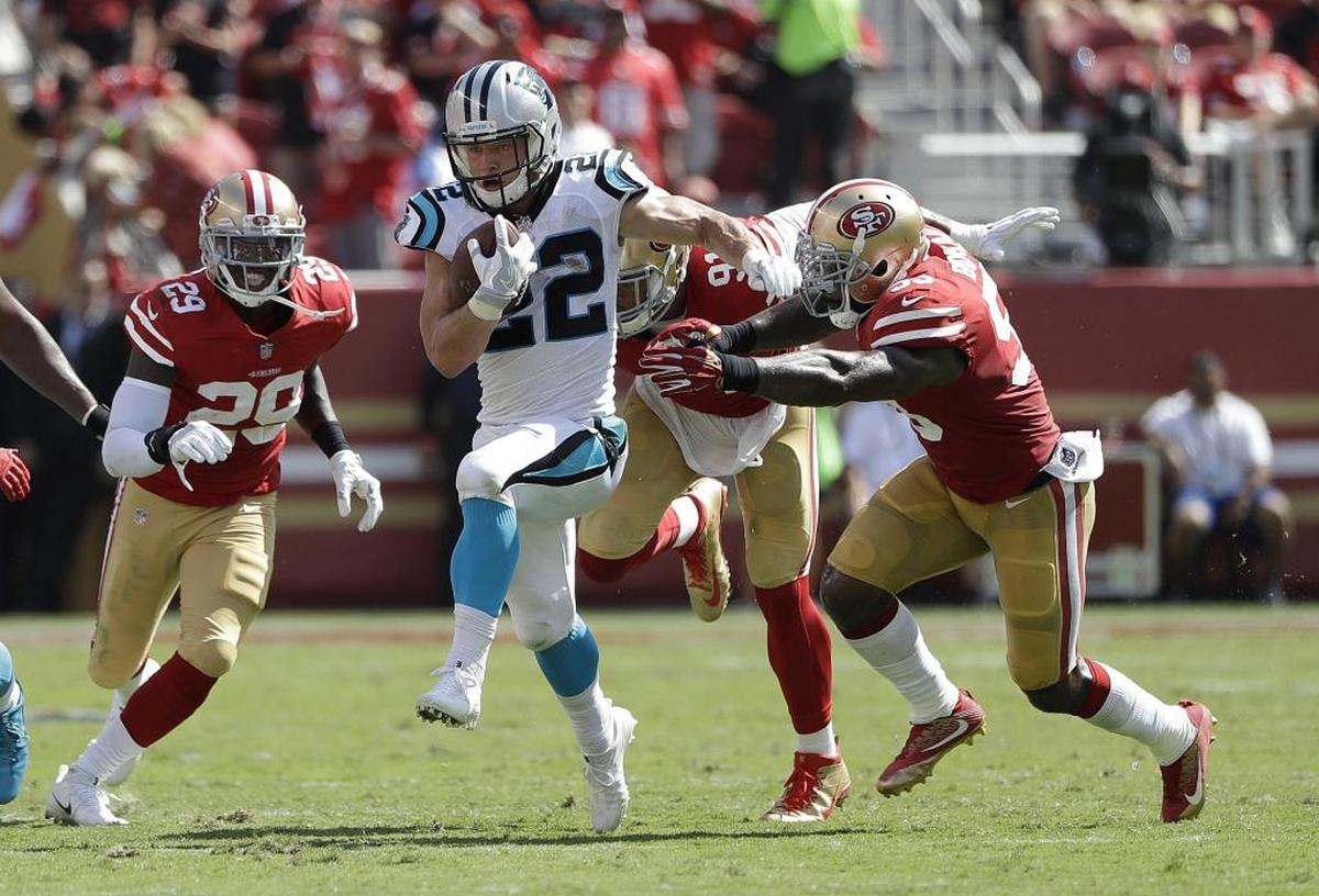 Carolina Panthers running back Christian McCaffrey (22) runs against the San Francisco 49ers during the first half of an NFL football game in Santa Clara, Calif., Sunday, Sept. 10, 2017. (AP Photo/Marcio Jose Sanchez)