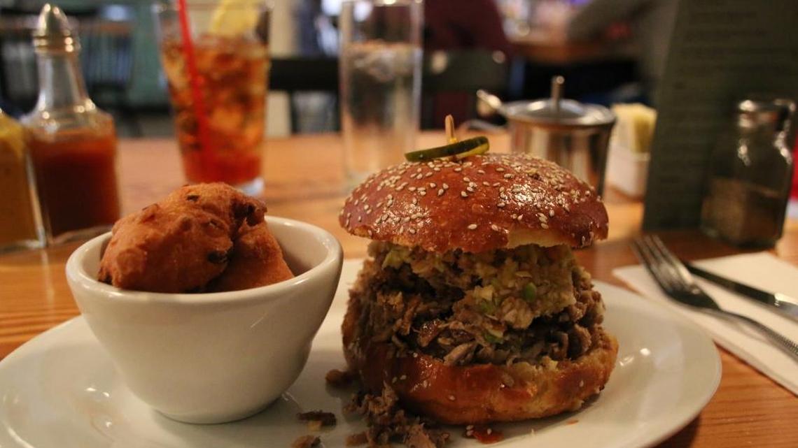 The barbecue sandwich and a side of hush puppies at Rusty’s Southern restaurant in San Francisco’s Tenderloin district.