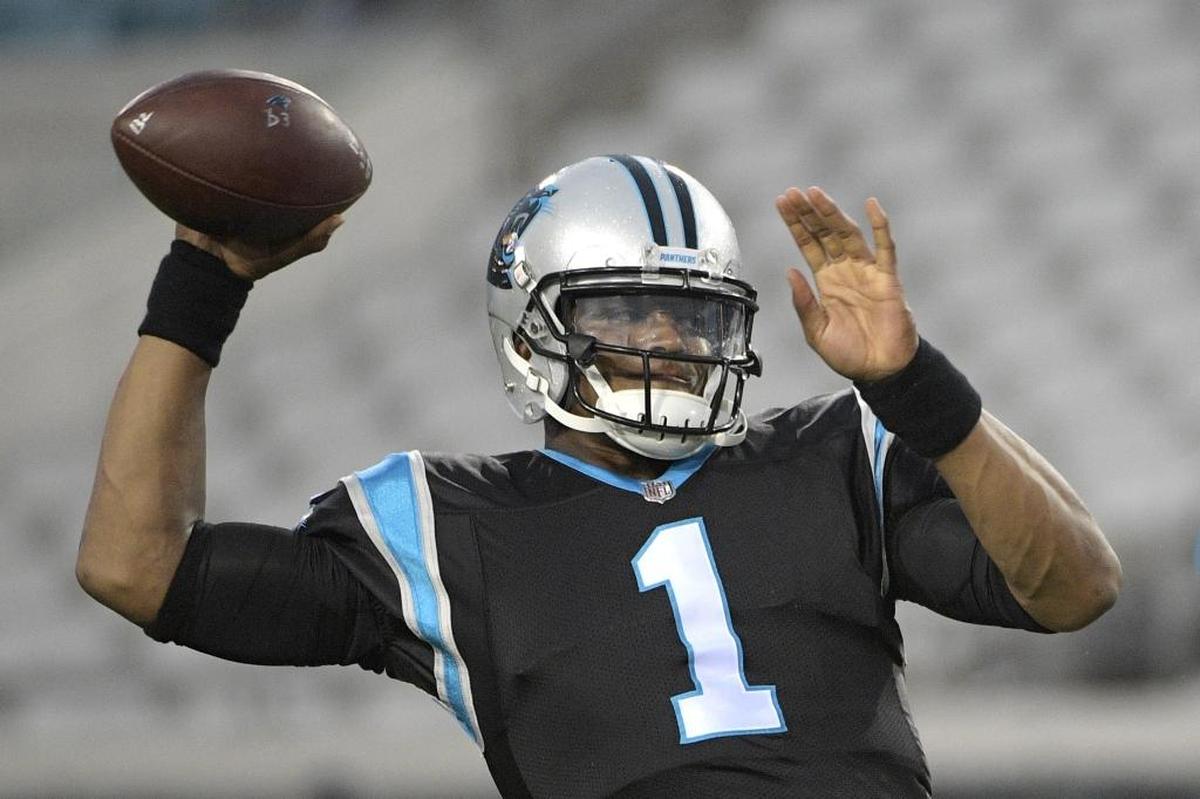 Carolina Panthers quarterback Cam Newton (1) warms up before an NFL preseason football game against the Jacksonville Jaguars, Thursday, Aug. 24, 2017, in Jacksonville, Fla. (AP Photo/Phelan M. Ebenhack)