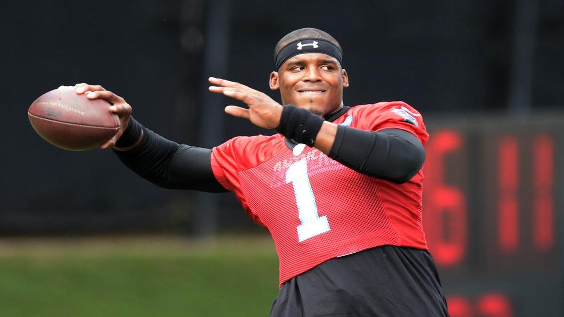 Carolina Panthers quarterback Cam Newton warms up at the team's practice facility near Bank of America Stadium on Aug. 22, 2016.