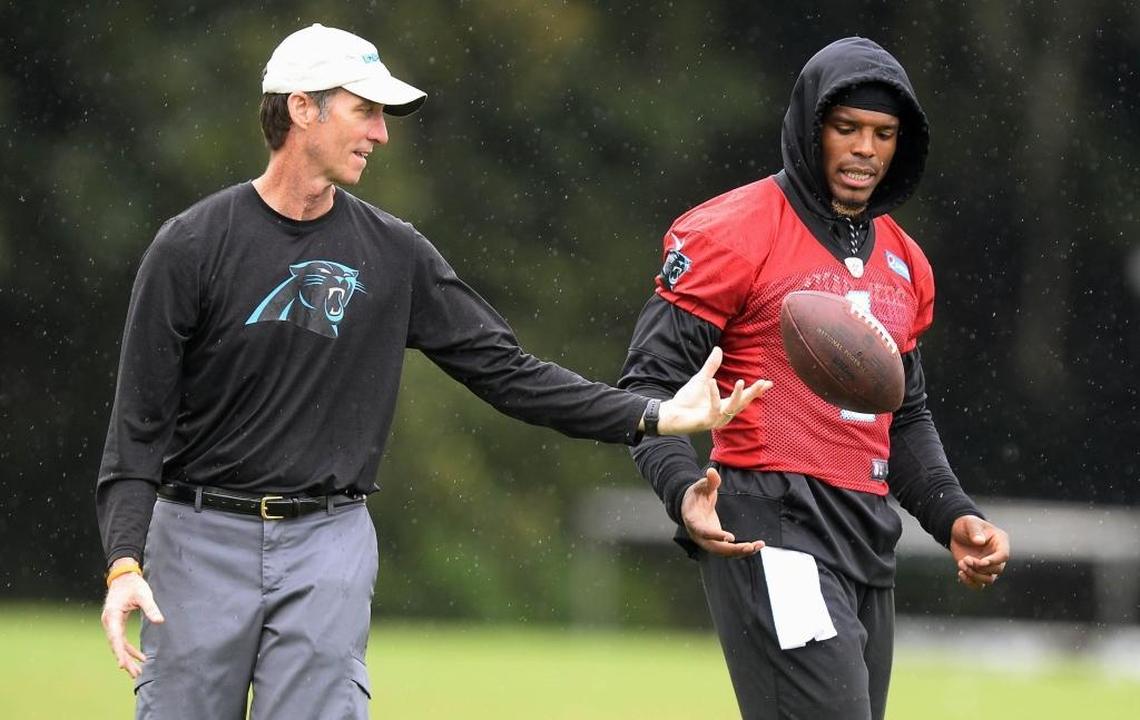 Carolina Panthers quarterback Cam Newton (1) talks with head athletic trainer Ryan Vermillion during training camp at Wofford College in Spartanburg, SC on Tuesday, August 8, 2017.