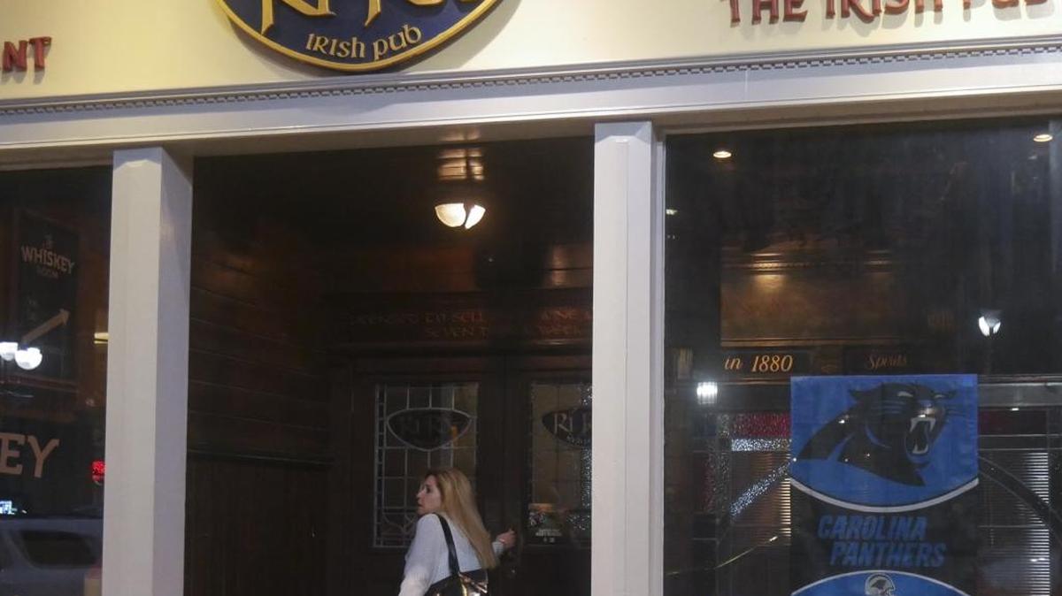 Irish pub Ri Ra in uptown Charlotte has devoted an entire window to display support for the Carolina Panthers.