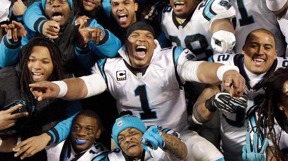 Cam Newton and teammates celebrate after winning the NFC Championship Sunday