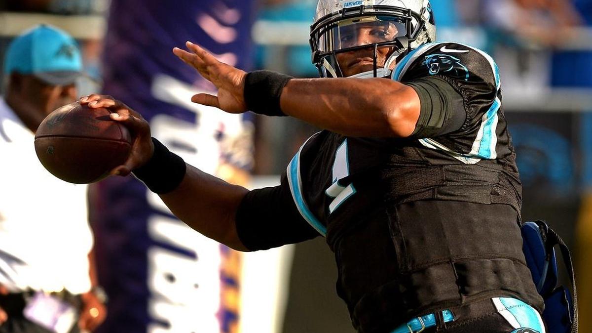 Carolina Panthers quarterback Cam Newton drops back to pass to a receiver prior to preseason action vs the Baltimore Ravens at M&T Stadium in Baltimore, MD. on Thursday, August 11, 2016.