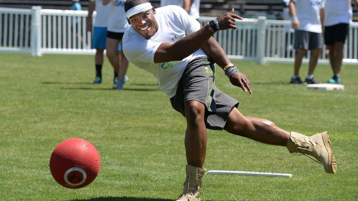 Cam Newton pitches the ball during his second kickball game at his annual Kick it with Cam! celebrity charity kickball tournament Friday afternoon at Memorial Stadium.