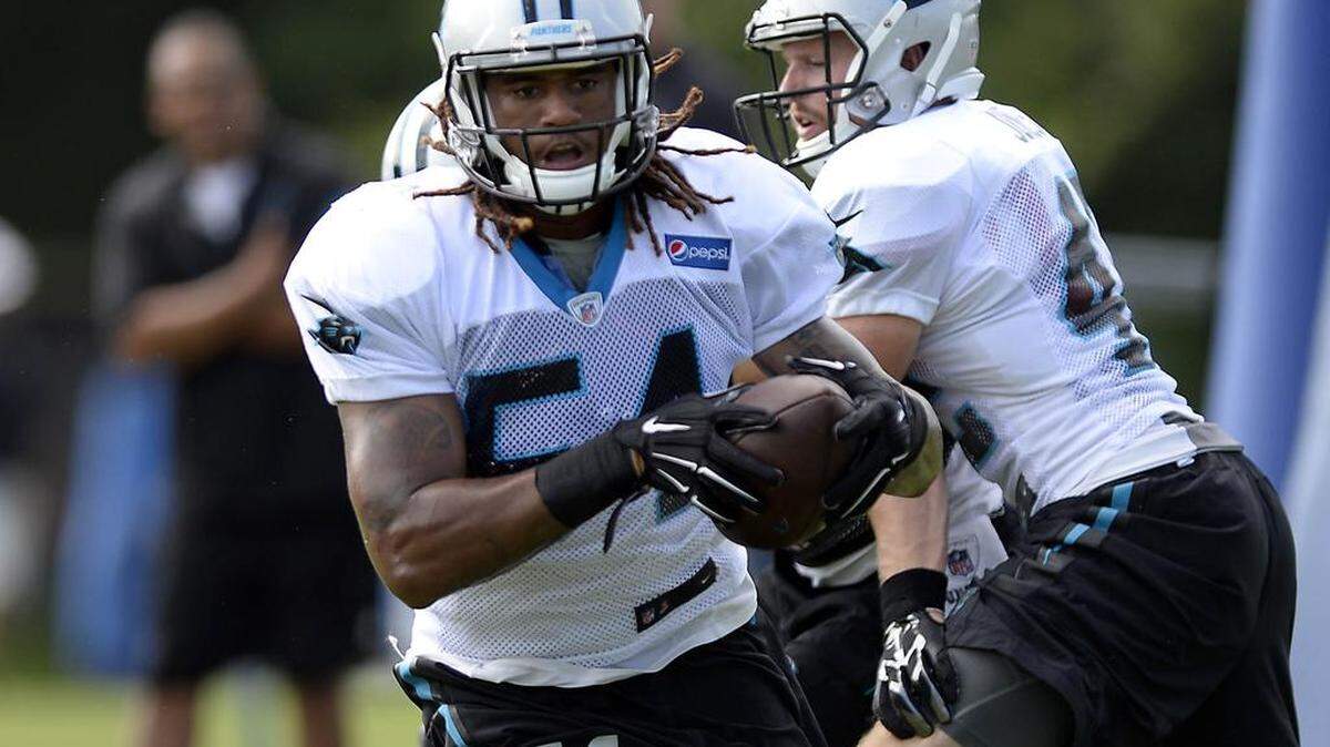 
Carolina Panthers linebacker Shaq Thompson (54) heads upfield as he returns an interception during the morning practice Tuesday in Spartanburg. It was first play during camp where Thompson, hampered by a hamstring injury, has flashed his potential. 

