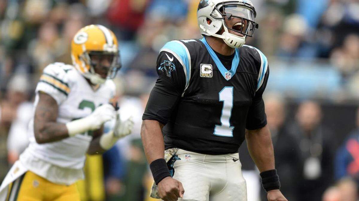 Carolina Panthers quarterback Cam Newton (1) celebrates a run against the Green Bay Packers during the first quarter at on Sunday.