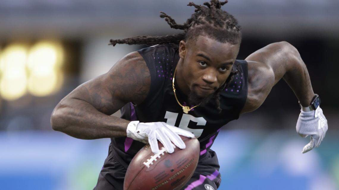 LSU defensive back Donte Jackson runs a drill at the NFL football scouting combine in Indianapolis, Monday, March 5, 2018. (AP Photo/Michael Conroy)
