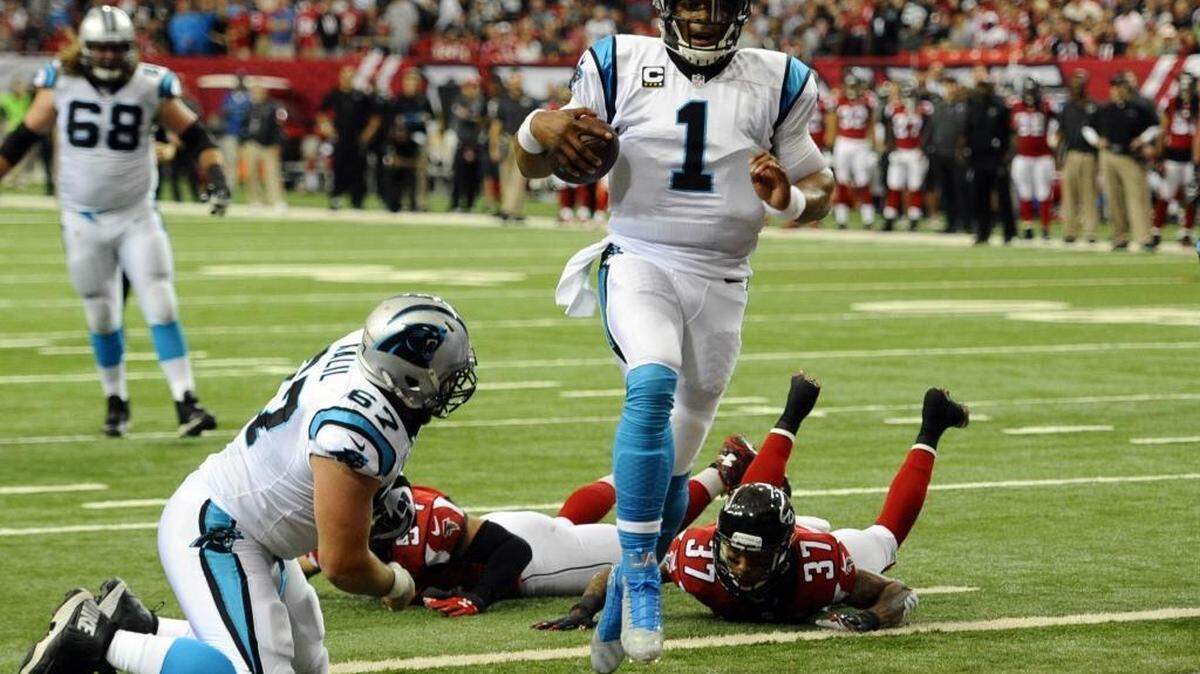 Carolina Panthers quarterback Cam Newton (1) scored a first-quarter touchdown past Atlanta Falcons defensive back Ricardo Allen (37), but there wasn’t much else for the MVP candidate.