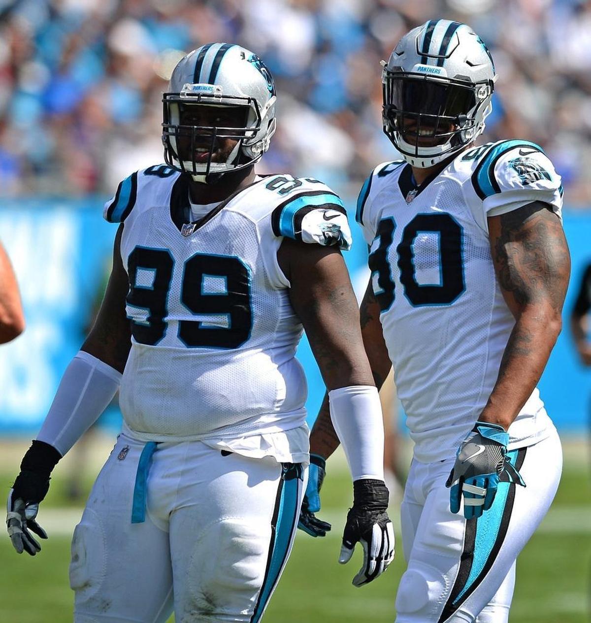 The disruptiveness of Carolina Panthers defensive tackle Kawann Short (99) has allowed teammates, including defensive end Julius Peppers (90) to shine.