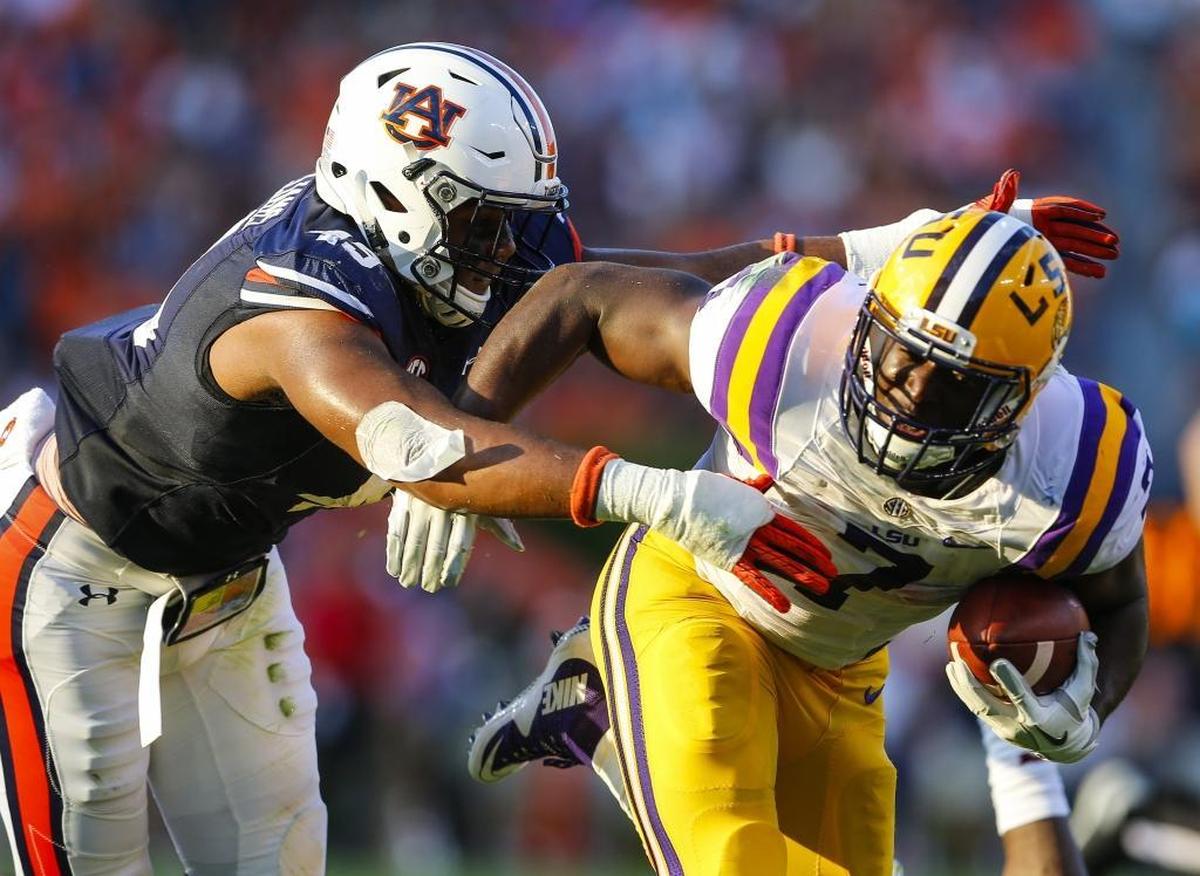 LSU running back Leonard Fournette (7) goes before the Carolina Panthers have a shot at him, at No. 4 to the Buffalo Bills.