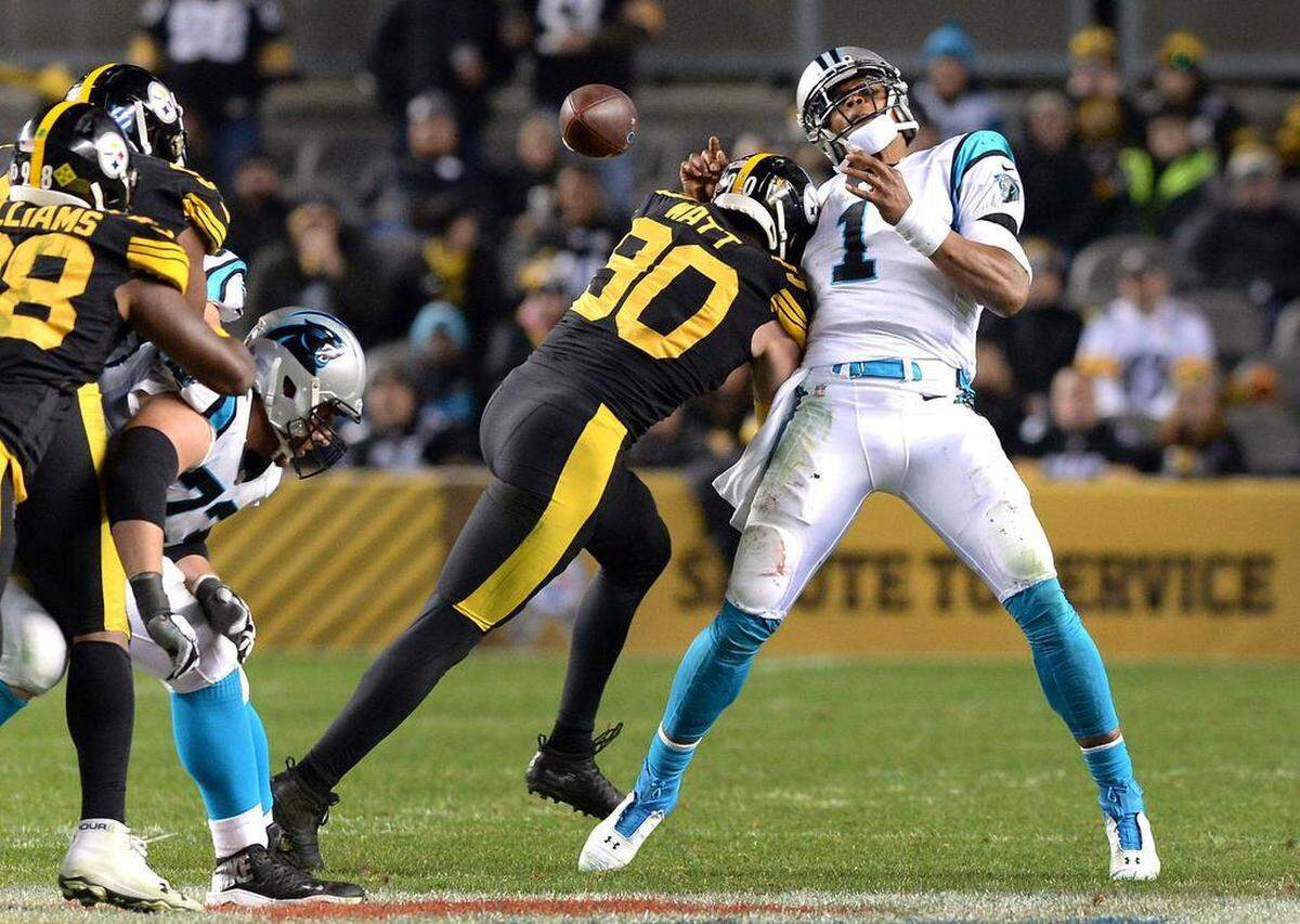 Jake Delhomme said he thought Cam Newton’s problems started in Pittsburgh in 2018, when he was sacked five times -- including this hit by T.J. Watt on his throwing shoulder.