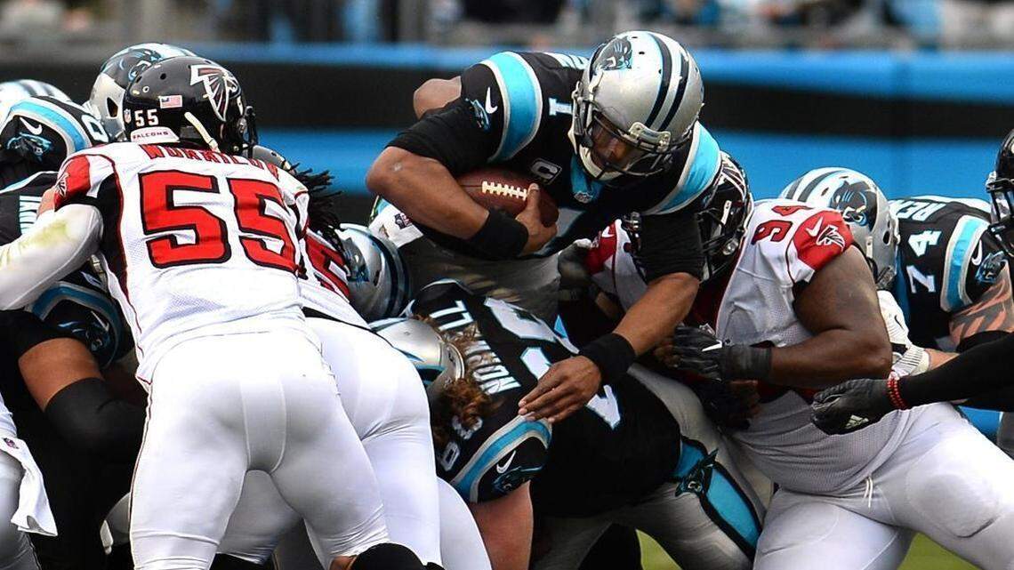 Carolina Panthers quarterback Cam Newton (with ball) raised concern with NFL commissioner Roger Goodell last season about the shots he was taking without drawing defensive penalties.