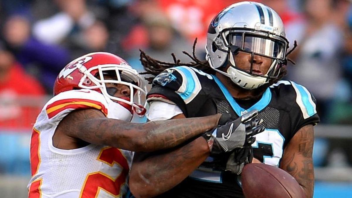 Carolina Panthers wide receiver Kelvin Benjamin, right, loses the ball as Kansas City Chiefs cornerback Marcus Peters, left, applies pressure during Sunday game.