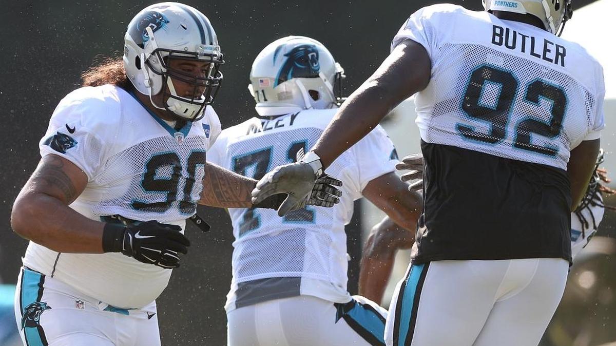 Carolina Panthers defensive tackle Paul Soliai, left and defensive tackle Vernon Butler, right, converge during practice on Sunday, July 31, 2016 at Wofford College in Spartanburg, S.C.