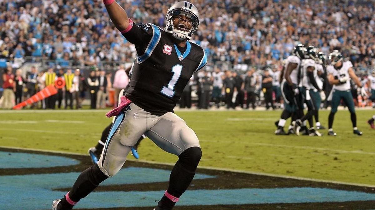 Carolina Panthers quarterback Cam Newton celebrates a touchdown run by fullback Mike Tolbert during third quarter action against the Philadelphia Eagles at Bank of America Stadium in Charlotte on Sunday. The Panthers defeated the Eagles 27-16.
