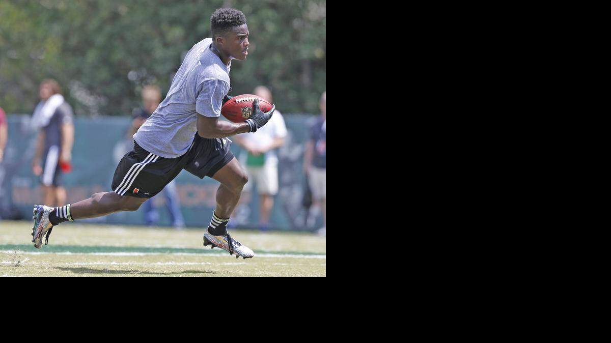 
Phillip Dorsett runs drills on Wednesday during the University of Miami Pro Day. Dorsett is a possible second-round target for the Panthers. 
