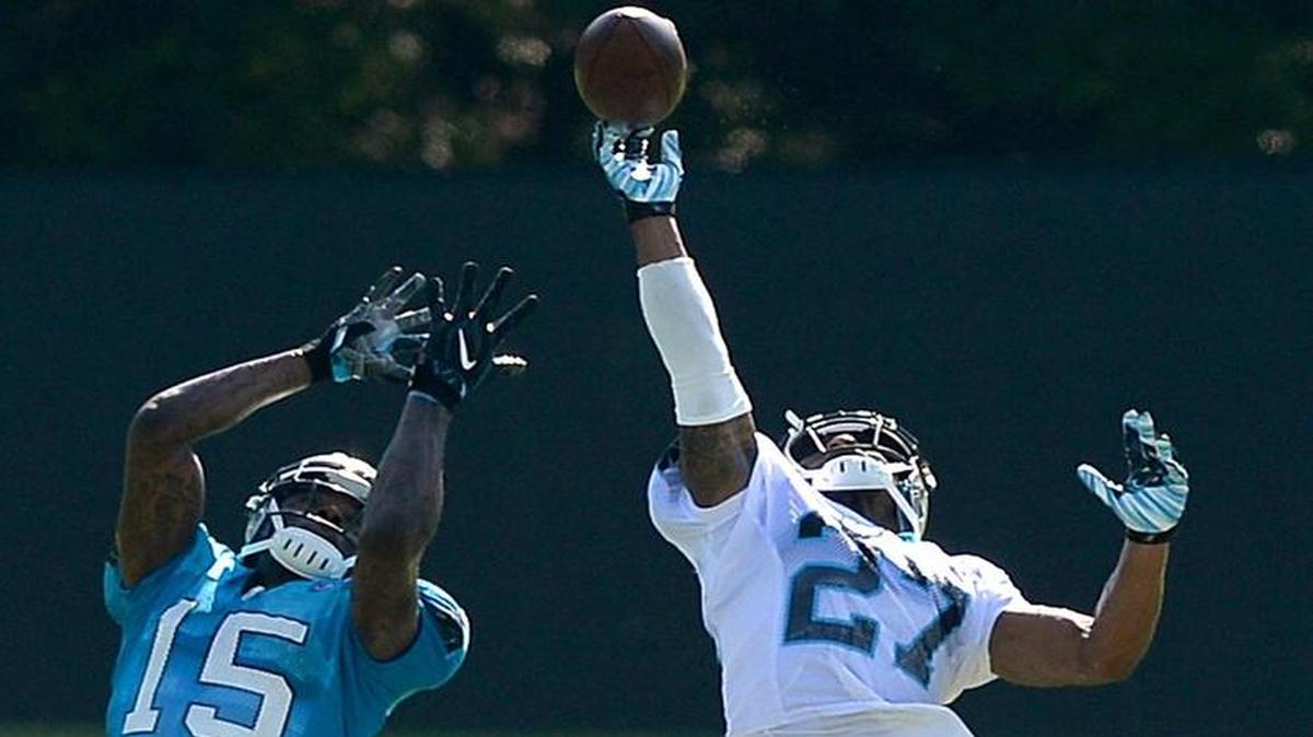 Carolina Panthers cornerback Robert McClain, right, breaks up a pass meant for wide receiver Keyarris Garrett, left, during practice on Sunday, July 31, 2016 at Wofford College in Spartanburg, S.C.