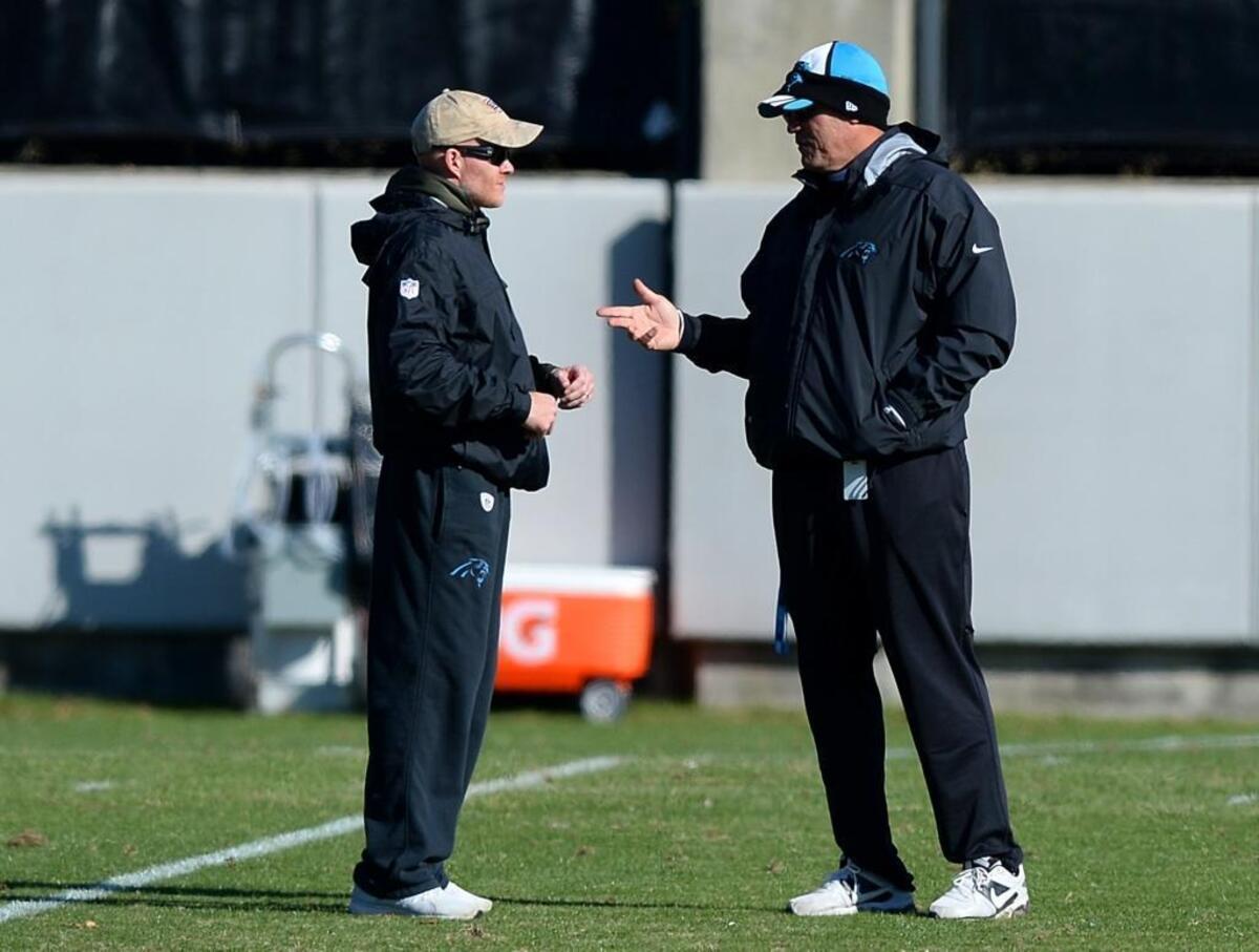 Former Carolina Panthers defensive coordinator Sean McDermott, left, and head coach Ron Rivera, right, talk during practice on Thursday, January 7, 2016. McDermott is now the head coach of the Buffalo Bills.