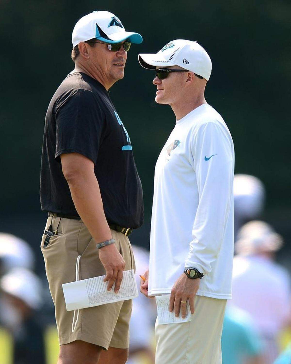 Buffalo Bills coach Sean McDermott (right) and Panthers coach Ron Rivera (left) will again share a field as the two teams share joint practices at training camp this summer.