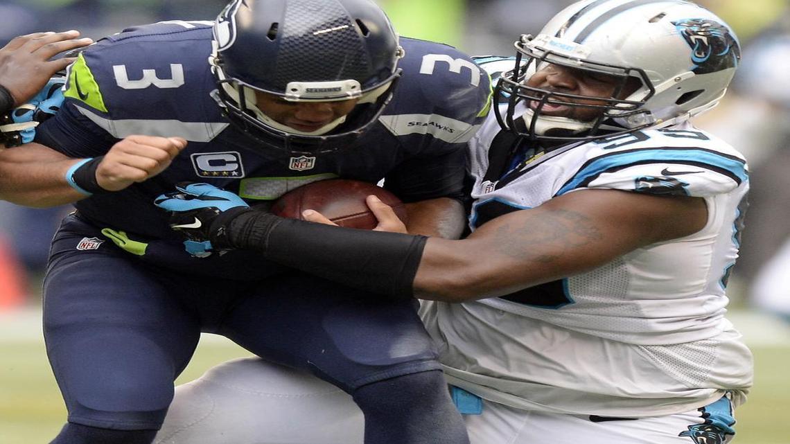 Carolina Panthers defensive tackle Kawann Short (99) was named NFC Defensive Player of the Week on Wendsday for his play against the Seattle Seahawks and quarterback Russell Wilson (3), whom he sacked twice in a 27-23 Panthers victory.