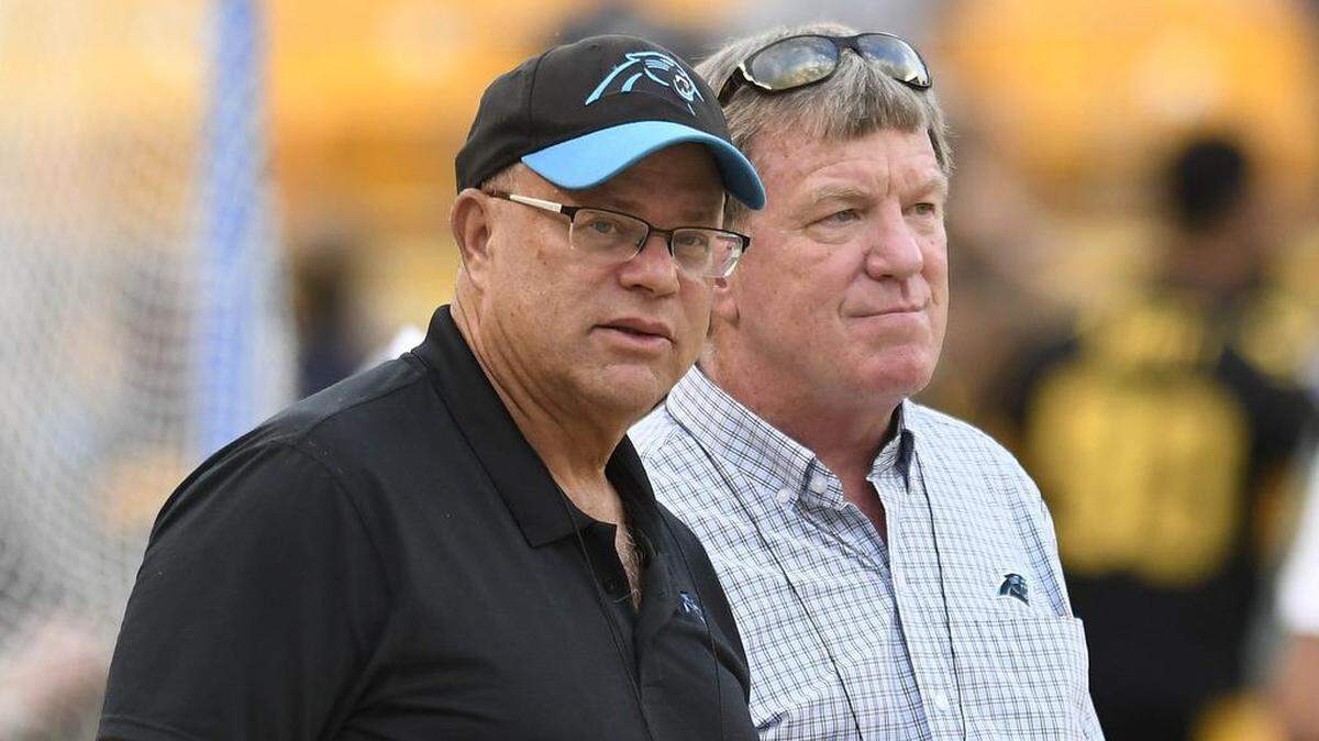 Carolina Panthers owner David Tepper, left, says the team will keep its options open in regards to Cam Newton and its quarterback situation.