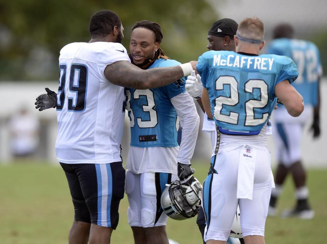 Carolina Panthers wide receiver Kaelin Clay (83) and Tennessee Titans defensive end Jurrell Casey (99) embrace at the end of a joint practice at Saint Thomas Sports Park in Nashville,TN on Wednesday, August 16, 2017.