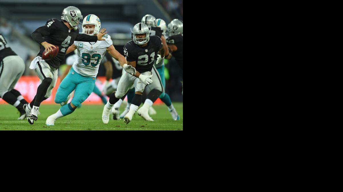 
Linebacker Jason Trusnik (93), who has spent the past four seasons with the Miami Dolphins, was signed to a one-year deal with the Carolina Panthers on Tuesday. Trusnik is also a special-teams ace. 
