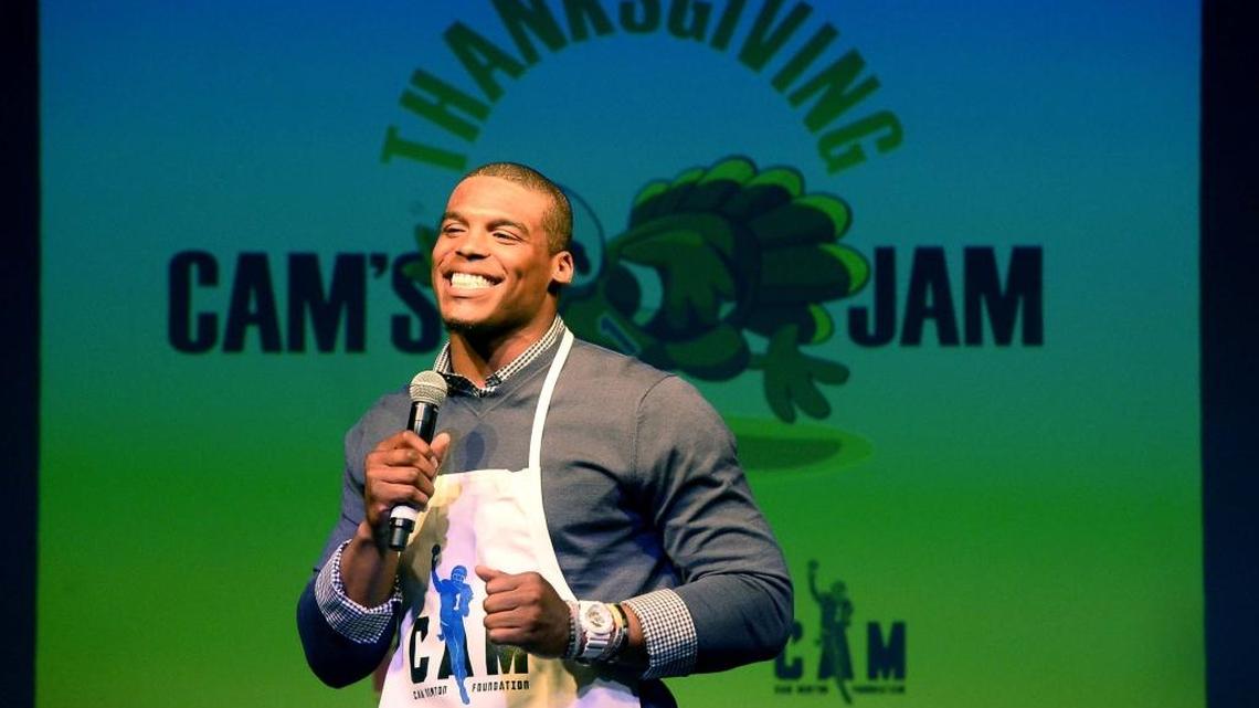 Panthers quarterback Cam Newton charms the audience during the Cam Newton Foundation’s “Cam’s Thanksgiving Jam” Newton, along with members of his family and more than 50 volunteers, served up a traditional Thanksgiving meal for 800 underprivileged kids held at The Fillmore on Monday.