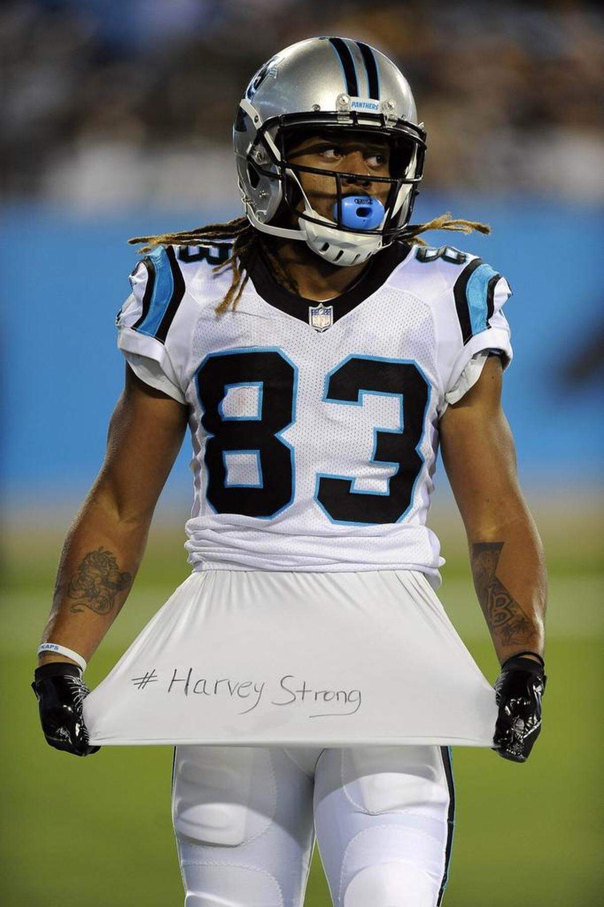 Carolina Panthers wide receiver Kaelin Clay (83) on Thursday had his best game this preseason by far, recording three receptions for 76 yards. Above, Clay displays his support for the people that endured Hurricane Harvey and its aftermath.