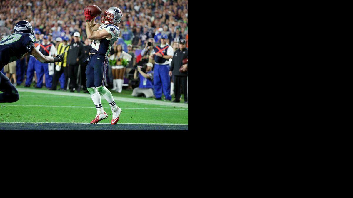 
New England Patriots wide receiver Julian Edelman catches the game-winning touchdown during last February’s Super Bowl. Edelman was in the game despite an earlier helmet-to-helmet hit. A new rule proposed by the NFL competition committee could force players to leave the field for concussion testing in the future, something Edelman did not do.

