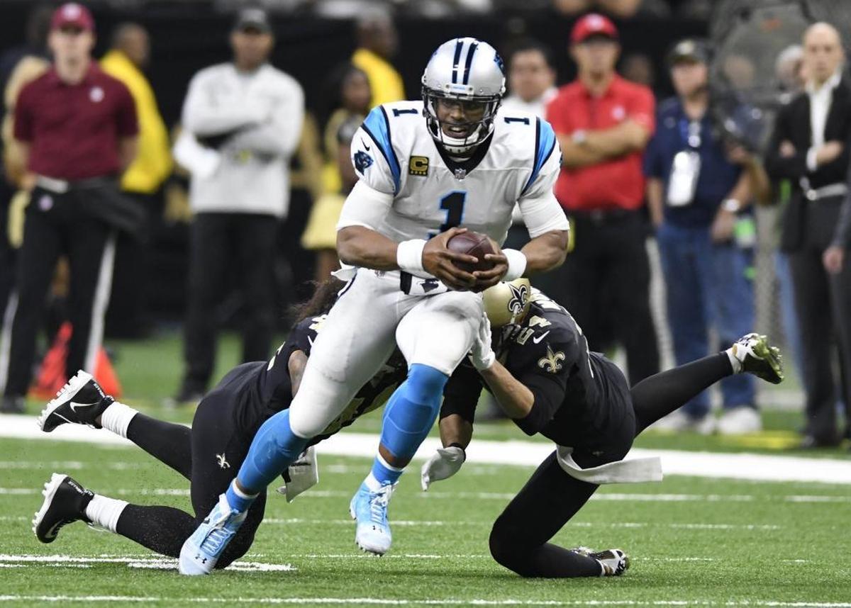 Carolina Panthers quarterback Cam Newton (1) is averaging 5.85 yards per carry this season and is on pace to rush for 720 yards.